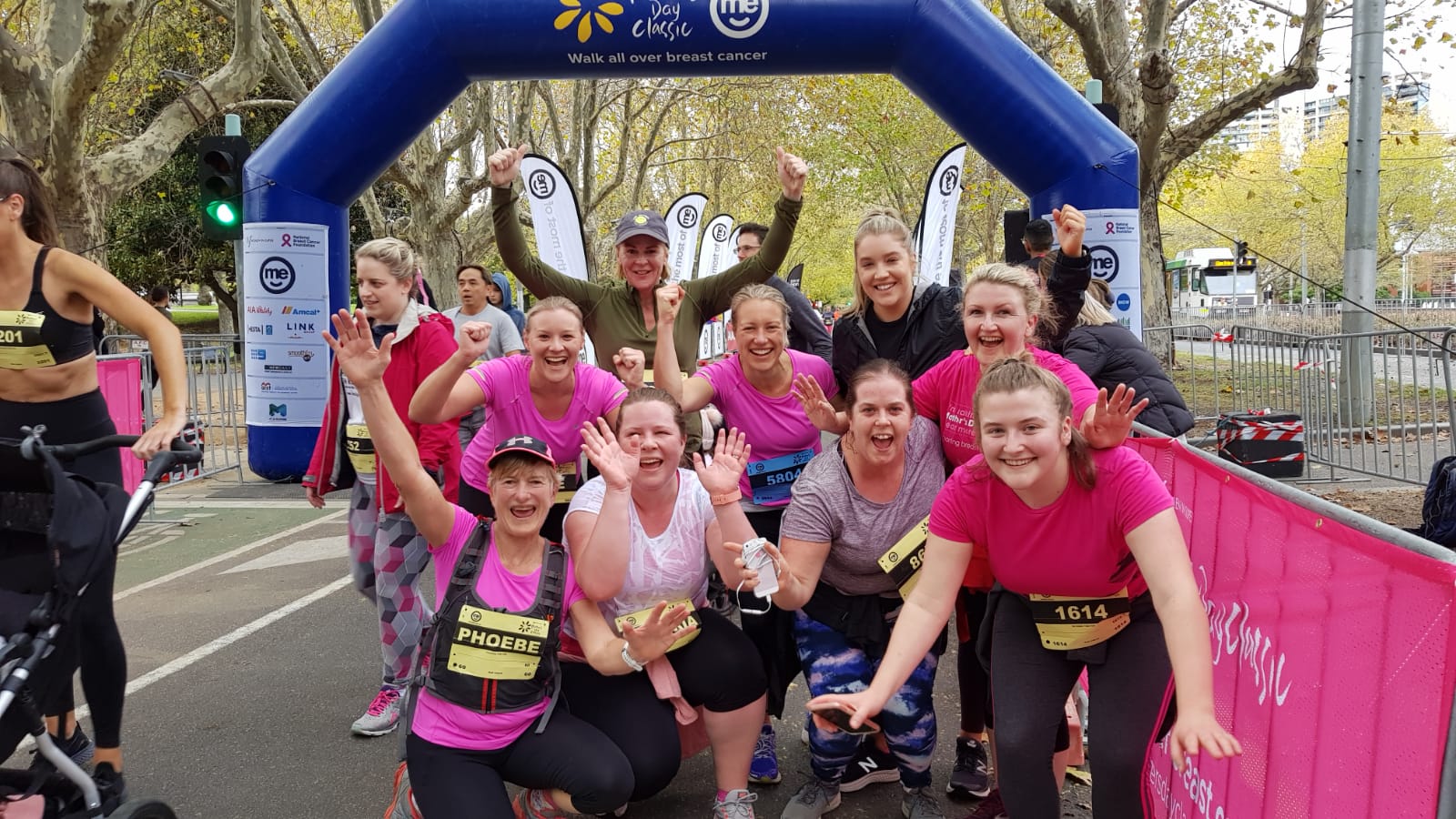 lessons for success - group of women in pink fitness gear running Mother's Day Classic
